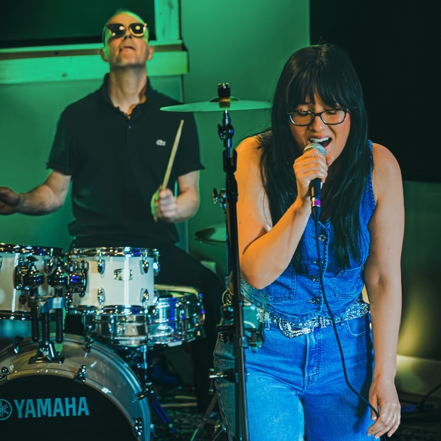 Tiffany performing with drummer